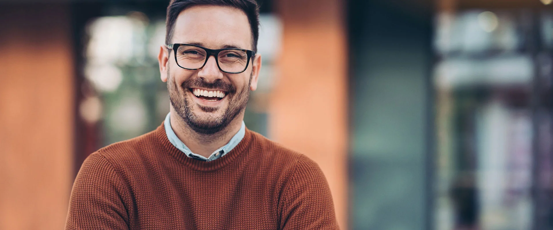 Smiling man wearing glasses
